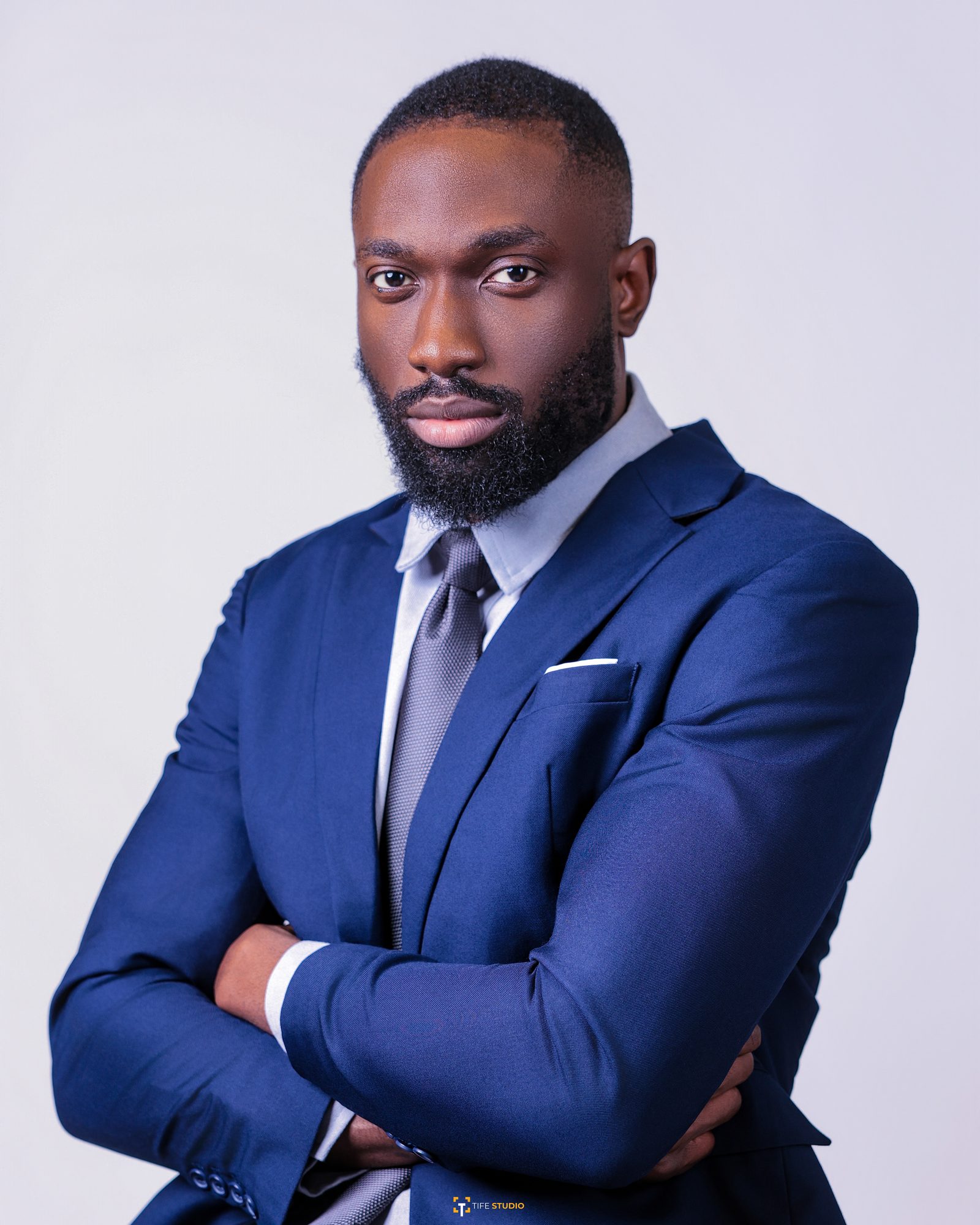 Corporate headshot - arms crossed power pose